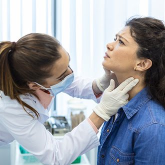Should I see an ENT or endocrinologist for thyroid